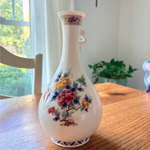 Fashionware bottle with Asian floral motif- fine bone China- great condition.